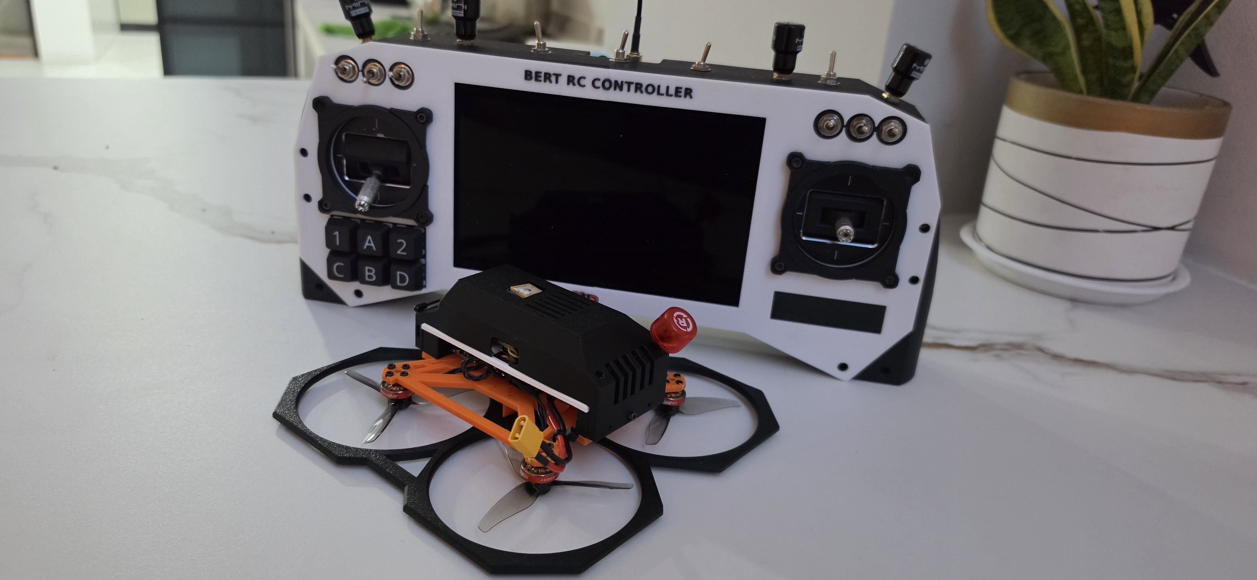 BERT RC Controller and the RubyFPV quadcopter on a desk